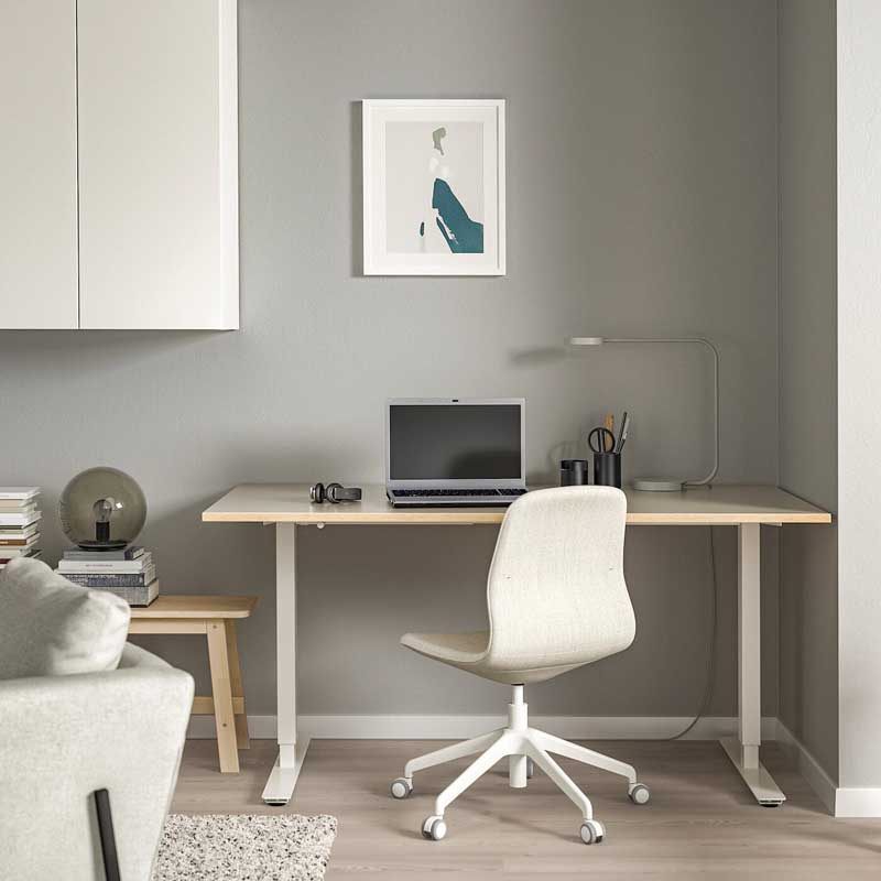 Ikea Skarsta Sit Stand Desk in a home office.